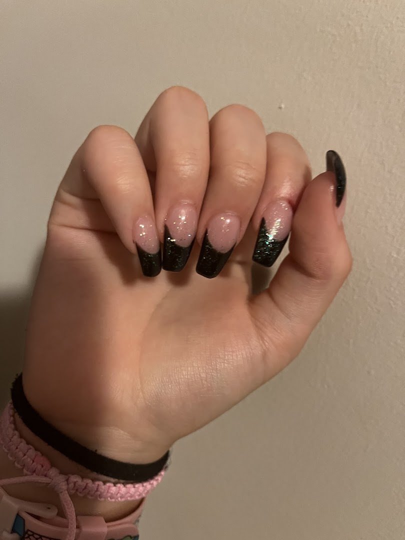 Close-up of fresh dipping powder nails.